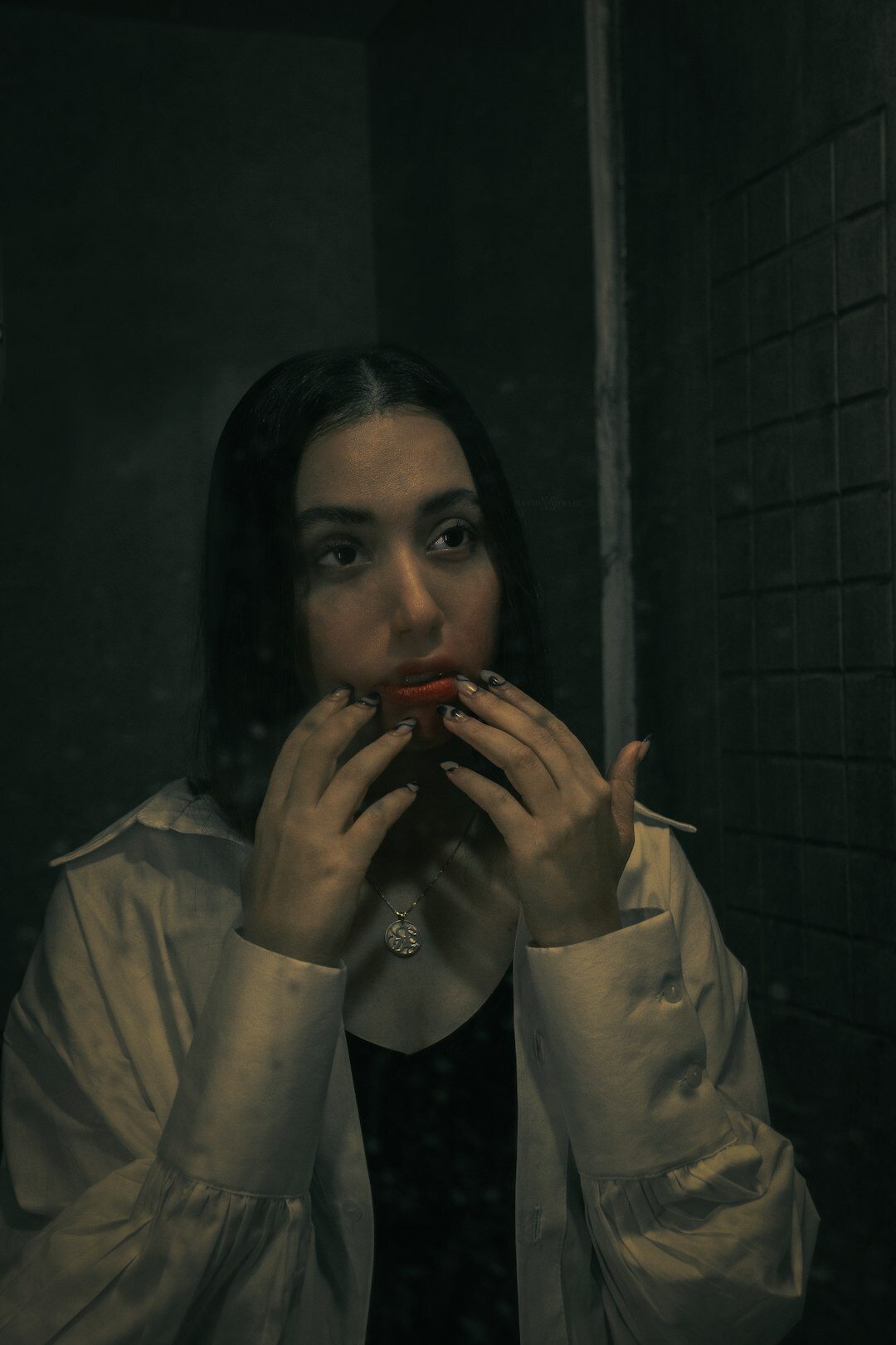 woman practicing rhetoric in front of mirror