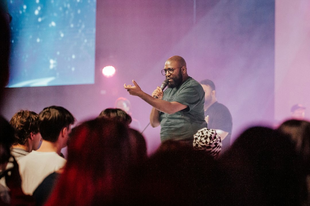 confident speaker on stage